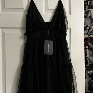 small prettylittlething black polka dot mini dress